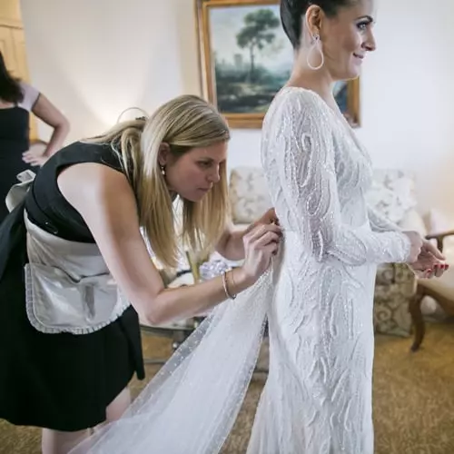 Your “Ladies-in-Waiting” take care of everything you need on your wedding day — from steaming the wedding dress to repairing broken zippers. Each stylist is trained and certified in The Stylish Bride® way. There is nothing we can’t handle. Our clients are perfectly Dressed, Styled, and Down the Aisle!